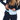 Woman with a Sherpani Soft Touch Concealed Waist Wallet Cool Blue around her waist on white background.