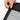Person locking the zipper pocket of a Sherpani Piper Sterling Crossbody Pouch. #color_sterling-pro