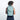 Woman wearing a Sherpani Camden Surf Blue Backpack on her back against white background.  #color_surf-blue