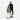 A woman holding a Sherpani Crew Dune Travel Backpack on top of a Sherpani Meridian Luggage against a white background. #color_dune-tan