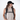 Woman wearing a Sherpani Getaway Raven Black Travel Backpack on her shoulders.