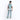 Man wearing a Sherpani Getaway Surf Blue Travel Backpack on his back against white backdrop.  #color_surf-blue
