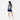 Woman wearing a Sherpani Juno Dolomite Duffel Backpack on her back against white backdrop.   #color_dolomite