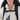 Woman wearing a Sherpani Juno Chromatic Black Duffel Backpack on her shoulders.