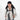 Woman wearing a Sherpani Juno Raven Black Duffel Backpack on her back against white backdrop.  #color_raven-black