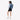 Woman wears a Sherpani Sojourn Seastone Multi-Wear Pack on her back against white backdrop. #color_seastone