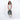 Woman holding Sherpani Soleil Aloe Mist Green Anti-theft Multi-Wear Travel Bag by handheld straps on white backdrop. #color_aloe-mist-green