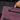 Person locking the zipper of a Sherpani Soleil Smoky Orchid Anti-theft Multi-Wear Travel Pack.
