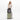 Woman holds Sherpani Soleil Passport Anti-theft Multi-Wear Travel Bag on Sherpani Meridian Matcha Carry-On on a white backdrop. #color_passport-print