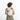 A woman wearing a Sherpani Wayfarer Terrazzo Print Convertible Sling on her back against white background.  #color_terrazzo-print