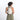 A woman wearing a Sherpani Wayfarer Terrazzo Print Convertible Sling on her back against white background.  #color_terrazzo-print