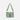 A Sherpani Ceara Olivine Expandable Crossbody, front view showing two front pockets and adjustable strap on a white background.  #color_olivine-green
