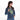 Woman wearing a Sherpani Hyk Olivine Hip Pack across her body against white backdrop.  #color_olivine-green