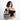 Woman holding a Sherpani Mei Houndstooth Anti-theft Travel Trio Crossbody by the short strap against white backdrop. #color_houndstooth-print