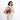 Woman wearing a Sherpani Mei Aloe Mist Green Anti-theft Travel Trio Crossbody by short strap against white backdrop.    #color_smoky-orchid-pink