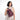 A woman wearing a Sherpani Metro Smoky Orchid Anti-theft Reversible Sling on her front against a white background.  #color_smoky-orchid-pink