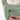 A close-up of a woman locking a zipper pocket on the Sherpani Mina Olivine Medium Crossbody Bag.