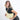 Woman wearing a Sherpani Mina Sol Yellow Medium Crossbody Bag against white background. #color_sol-yellow