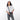 Woman wearing a Sherpani Prima Granite Travel Crossbody on her shoulder against white background.  #color_granite-grey