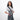 Woman wearing a Sherpani Prima Houndstooth Travel Crossbody on her shoulder against white background.  #color_houndstooth-print