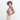 Woman wearing a Sherpani Rogue Desert Pink Mini Crossbody on her shoulder against white background.  #color_desert-pink