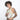 Woman wearing a Sherpani Rogue Terrazzo Print Mini Crossbody on her shoulder against white background.  #color_terrazzo-print