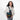 Woman wearing a Sherpani Sadie Chormatic Black Crossbody Bag on her shoulder against white backdrop. #color_chromatic-black