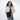 A woman wearing Sherpani Sadie Raven Black Crossbody Bag against a white background. #color_raven-black