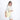Woman wearing a Sherpani Sadie Sol Yellow Crossbody Bag on her shoulder against white backdrop. #color_sol-yellow