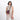Woman wearing a Sherpani Simplicity Smoky Orchid Crossbody Wallet against white backdrop. #color_smoky-orchid-pink