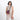 Woman wearing a Sherpani Simplicity Smoky Orchid Anti-Theft Crossbody Wallet on her shoulder against white backdrop.  #color_smoky-orchid-pink