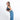 Woman wearing a Sherpani Skye Chromatic Black Shoulder Bag by short strap against white backdrop. #color_chromatic-black