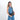 Woman wearing a Sherpani Skye Chromatic Black Shoulder Bag by short strap against white backdrop. #color_chromatic-black