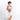 Woman wearing a Sherpani Skye Desert Pink Shoulder Bag against white backdrop. #color_desert-pink