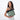 A woman holding Sherpani Vale Aloe Mist Green Anti-theft Reversible Crossbody around her shoulder with the front folded over. #color_aloe-mist-green