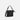 A Sherpani Vale Carbon Black Anti-theft Reversible Crossbody, 3/4 view showing folded over front on white background. #color_carbon