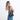 Woman wearing a Sherpani Zoom Chromatic Black Slim RFID Crossbody against white background. #color_chromatic-black