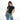 Woman wearing a Sherpani Zoom Oiivne Slim RFID Crossbody against white background. #color_olivine-green