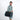 Man wearing a Sherpani Jaunt Chromatic Black Garment Duffle by long strap against white backdrop.    #color_chromatic-black