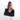 Woman wearing a Sherpani Jaunt Raven Black Garment Duffle against white backdrop. #color_raven-black