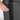 Person pulling zipper extender on a Sherpani Meridian Granite Checked-Luggage. #color_granite-grey