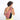 Woman wearing a Sherpani Esprit Desert Pink Sling Bag against white background.  #color_desert-pink