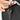 Person placing a key on a keychain inside a Sherpani Esprit Raven Black Sling Bag.
