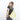 Woman wearing a Sherpani Esprit Sol Yellow Sling Bag against white background.  #color_sol-yellow