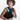 A Woman placing a phone into the stap pocket of a Sherpani Esprit Surf Blue Sling against white backdrop. #color_surf-blue