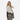 A woman wearing a Sherpani Jetsetter Ciao Travel Tote Bag by the crossbody strap on white backdrop.  #color_ciao-print