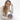 Woman holding a Sherpani Barcelona Passport Anti-Theft Mini Wallet on white backdrop.  #color_passport-print