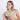 Woman holding a Sherpani Barcelona Palm Green RFID Mini Wallet on white backdrop.  #color_palm-green