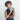 Woman holding a Sherpani Barcelona Surf Blue RFID Mini Wallet on white backdrop.   #color_surf-blue