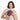 Woman holding a Sherpani Tulum Smoky Orchid Anti-Theft Wallet against white background.  #color_smoky-orchid-pink